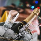 party-glasses-bottle-champagne-ice-container_447-19327037